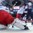 PRAGUE, CZECH REPUBLIC - MAY 16: Russia's Artemi Panarin #9 collides with USA's Matt Hendricks #23 in front of Russia's Sergei Bobrovski #72 during semifinal round action at the 2015 IIHF Ice Hockey World Championship. (Photo by Richard Wolowicz/HHOF-IIHF Images)

